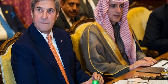 U.S. Secretary of State John Kerry, left, and Saudi Arabia's Foreign Minister Adel al-Jubeir, right, attend a meeting where they discussed the crisis in Syria, in Lausanne, Switzerland, Saturday, Oct. 15, 2016. (Jean-Christophe Bott/Pool Photo via AP)