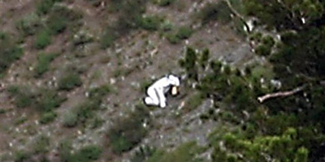 July 15, 2012: A person is seen in a goat suit in the Wasatch Mountains on Ben Lomond peak outside of Ogden, Utah. Wildlife officials are worried he could be in danger as goat hunting season approaches.