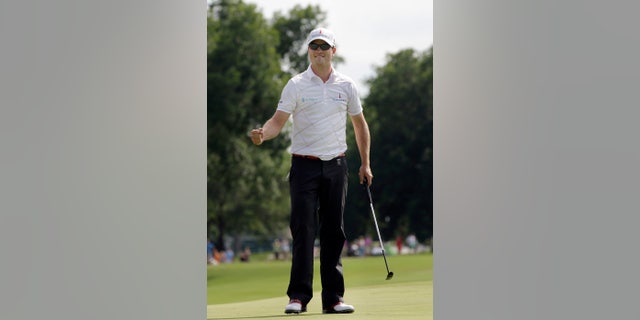 FILE - In this May 27, 2012, file photo, Zach Johnson pumps his fist after winning the Colonial golf tournament in Fort Worth, Texas. Johnson has won two of the last three Colonials. A trip to Hogan's Alley may be just what he needs. Johnson, who doesn't have a top-10 finish this season, is the only golfer in three decades with four consecutive top 10s at Colonial. (AP Photo/LM Otero, File)