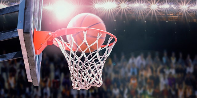 College fans erupt after basketball player shoots hoops during national ...
