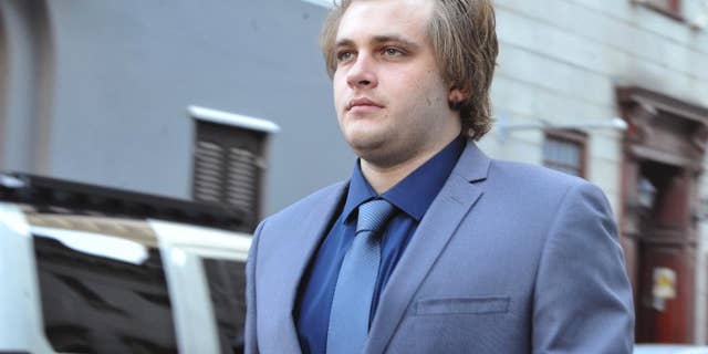 Henri Van Breda arrives at the High Court in Cape Town, South Africa, Monday, April 24, 2017. He is accused of murder of his parents and older brother in 2015. Breda pleaded not guilty to murder and to the attempted murder of his sister with an axe. (AP Photo)