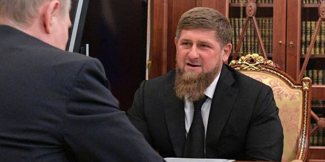 In this file photo taken Wednesday, April 19, 2017, Russian President Vladimir Putin, left, meets with Chechnya's regional leader Ramzan Kadyrov in the Kremlin in Moscow, Russia. 