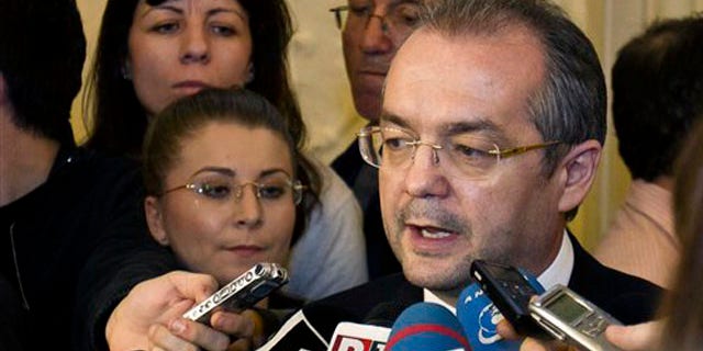 Jan. 23, 2012: Romanian Premier Emil Boc speaks to the media at the Romanian parliament in Bucharest, Romania.