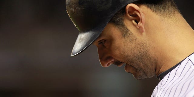 Oct 6: Jorge Posada of the New York Yankees walks back to the dugout with his head down after he grounded out in the bottom of the eighth inning against the Detroit Tigers during Game Five of the American League Championship Series at Yankee Stadium.