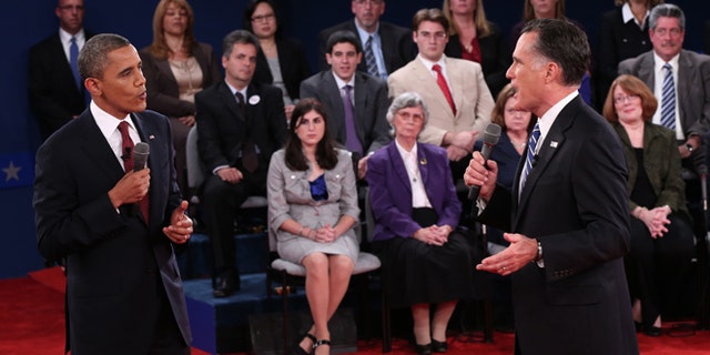 Oct. 16, 2012: President Barack Obama and Republican presidential nominee Mitt Romney confront each other during the second presidential debate at Hofstra University in Hempstead, N.Y.