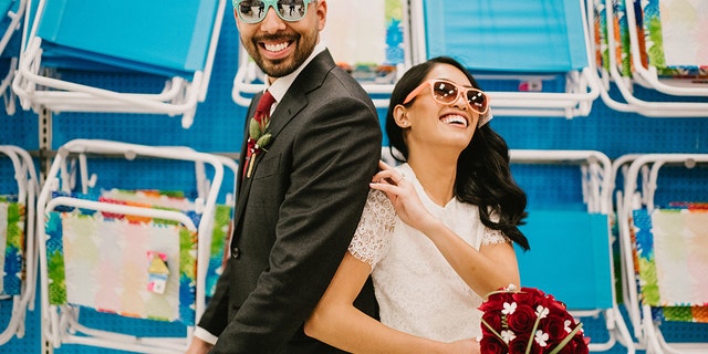 he caught sweet shots of the couple sharing a slushie, trying Rich caught photos of the pair trying on sunglasses, riding a bicycle, picking up frozen pizzas, and enjoying all the retail superstore has to offer.