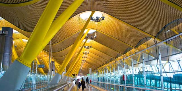 MADRID, SPAIN - FEBRUARY 16: Madrid Barajas airport, main international airport of the capital of Spain of Madrid on February 16, 2013 in Madrid, Spain.; Shutterstock ID 138671297; Project/Title: World's Coolest Modern Airports; Downloader: Melanie Marin