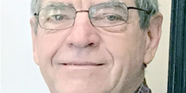 Russ Kurth was found outside of a grain bin after the door had failed.