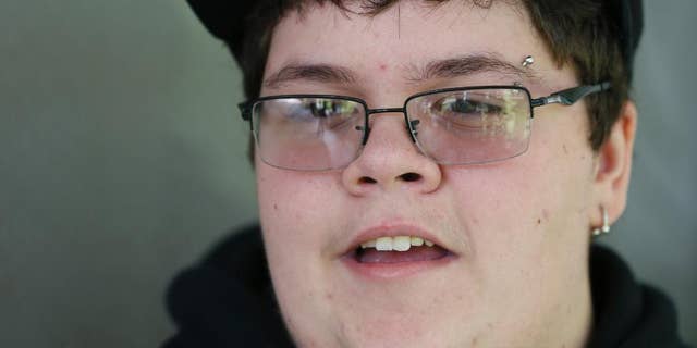 This Tuesday Aug. 25, 2015 photo shows Gavin Grimm speaks during an interview at his home in Gloucester, Va. Grimm is a transgender student whose demand to use the boys' restrooms has divided the community and prompted a lawsuit. (AP Photo/Steve Helber)