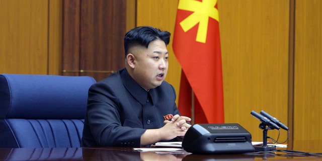 In this undated photo released by the Korean Central News Agency and distributed Sunday, Feb. 3, 2013 in Tokyo by the Korea News Service, North Korean leader Kim Jong Un attends an enlarged meeting of the Central Military Commission of the Workers' Party of Korea at an undisclosed location of North Korea. Kim issued “important” guidelines on how to bolster the army and protect the nation's sovereignty at the high-level ruling Workers' Party meeting, state media said Sunday, an indication Pyongyang has finalized formal procedural steps and is ready to conduct an atomic test. (AP Photo/Korean Central News Agency via Korea News Service) JAPAN OUT UNTIL 14 DAYS AFTER THE DAY OF TRANSMISSION