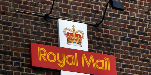 A Royal Mail Post Office is seen in London, Thursday, Oct. 10, 2013. British Business Secretary Vince Cable defended the government's sale of a majority stake in Royal Mail on Wednesday, saying that more than 700,000 retail investors have sought shares in the initial public offering. Shares are expected to be priced at between 260 pence and 330 pence, giving Royal Mail a market valuation of between 2.6 billion pounds (4.1 billion US dollars) and 3.3 billion pounds. The government would raise between 1.04 billion pounds and 1.72 billion pounds based on these figures.(AP Photo/Lefteris Pitarakis)