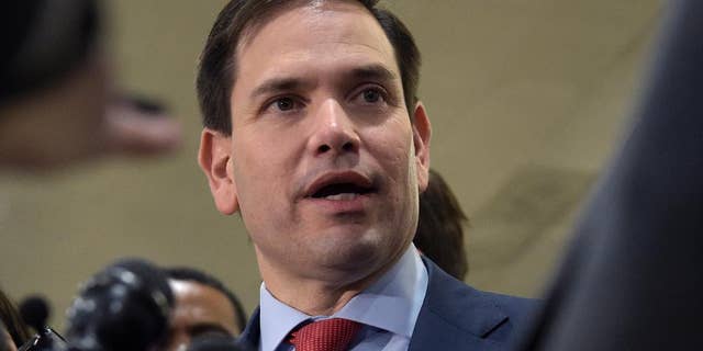 FILE - In this April 7, 2017, file photo, Sen. Marco Rubio, R-Fla., speaks to reporters on Capitol Hill in Washington. Congressional Republicans and Democrats have reached agreement on a bill to make it easier for the Department of Veterans Affairs to fire its employees. It's part of an accountability effort touted by President Donald Trump. The measure led by Rubio softens portions of a bill that passed the House in March. Democrats had criticized that bill as unfairly harsh on workers. (AP Photo/Susan Walsh, File)