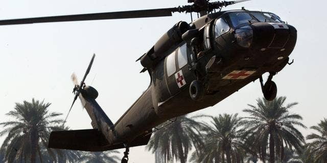 A U.S. Army Blackhawk medevac helicopter arrives with wounded soldiers at the 31st Combat Support Hospital in Baghdad, Iraq Tuesday, Nov. 9, 2004. (AP Photo/John Moore)