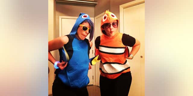 Stacy Bailey (left) is a Texas teacher who alleges she was suspended after showing this photo of her and her girlfriend to students.