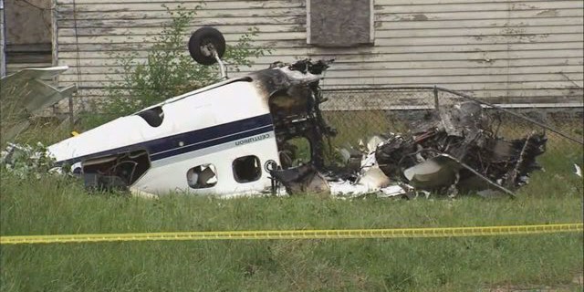 Investigators say the plane ran out of fuel, hit two trees and a power line, and then exploded into flames.