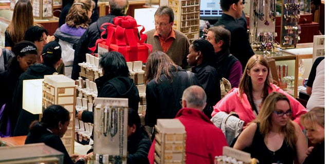 Macy's aisles are crowded with shoppers on Black Friday  called that because the surge of shoppers could take retailers into profitability, on Friday, Nov. 26, 2010, in Manhattan, New York.  (AP Photo/Bebeto Matthews)