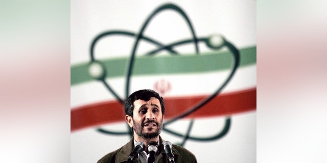 TO GO WITH STORY IRAN NUCLEAR  -FILE- In this April 9, 2007, file photo, Iranian President Mahmoud Ahmadinejad speaks at a ceremony in Iran's nuclear enrichment facility in Natanz, south of capital Tehran, Iran.  Technicians upgrading Iran’s main uranium enrichment facility have tripled partial or full installations of high-tech machines that could be used in a nuclear weapons program to more than 600 since starting their work three months ago, according to diplomats who demanded anonymity because they said they are not authorized to disclose the information, Wednesday April 17, 2013.   (AP Photo/Hasan Sarbakhshian, File)