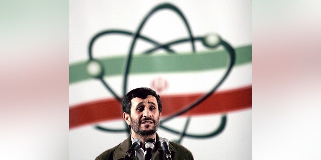 TO GO WITH STORY IRAN NUCLEAR -FILE- In this April 9, 2007, file photo, Iranian President Mahmoud Ahmadinejad speaks at a ceremony in Iran's nuclear enrichment facility in Natanz, south of capital Tehran, Iran. Technicians upgrading Iran’s main uranium enrichment facility have tripled partial or full installations of high-tech machines that could be used in a nuclear weapons program to more than 600 since starting their work three months ago, according to diplomats who demanded anonymity because they said they are not authorized to disclose the information, Wednesday April 17, 2013. (AP Photo/Hasan Sarbakhshian, File)