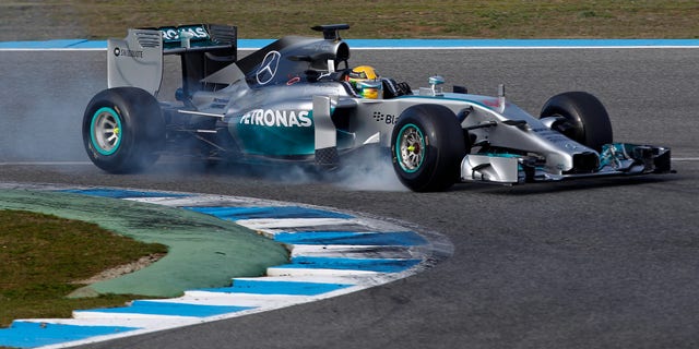 Mercedes driver Lewis Hamilton of Great Britain drives his Mercedes W05 Formula One car at the Circuito de Jerez on Tuesday, Jan. 28, 2014, in Jerez de la Frontera, Spain. (AP Photo/Miguel Angel Morenatti)