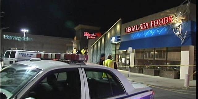 February 22, 2014: Authorities gather outside the Walt Whitman Shops in Huntington Station, N.Y. following a gas leak (MyFoxNY.com)