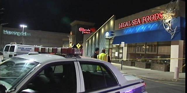February 22, 2014: Authorities gather outside the Walt Whitman Shops in Huntington Station, N.Y. following a gas leak (MyFoxNY.com)