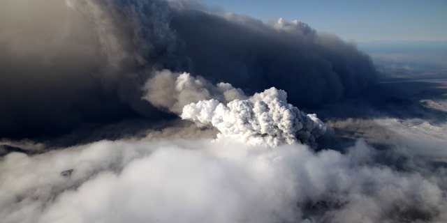 April 19: This aerial photo shows a plume of ash rising from the volcano in southern Iceland's Eyjafjallajokull glacier.