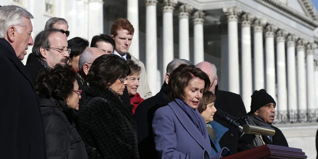 WASHINGTON, DC - FEBRUARY 13: House Minority Leader Nancy Pelosi (D-CA), joined by other members of the House Democratic caucus, speaks during a news conference on the steps of the U.S. Capitol February 13, 2015 in Washington, DC. House Democrats held the news conference to call on House Republicans to pass a "clean" funding bill for the Department of Homeland Security. (Photo by Win McNamee/Getty Images)