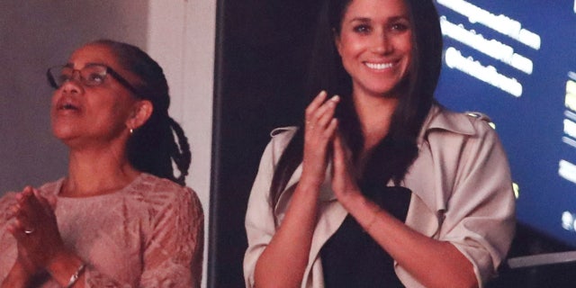 Meghan Markle, right, watches the closing ceremony for the Invictus Games with her mother.