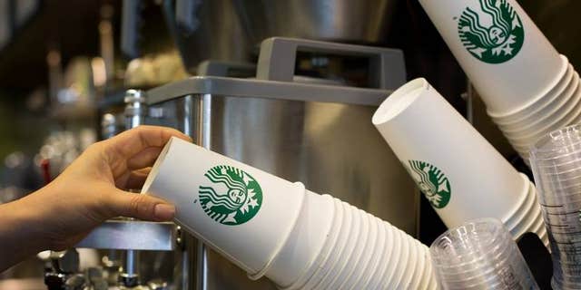 A Starbucks customer has accused a young employee of copying her credit card information.