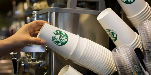 A Starbucks customer has accused a young employee of copying her credit card information.