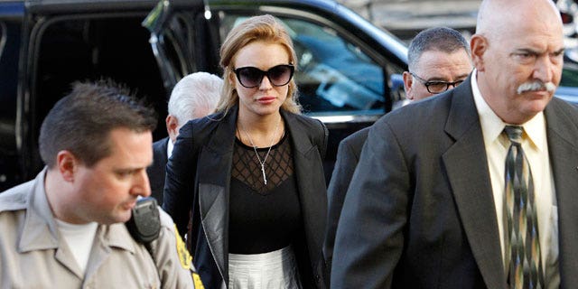 Sept. 24: Lindsay Lohan arrives at a court hearing in Los Angeles after failing a court-mandated drug test. She will now appear in a biopic about John Gotti.
