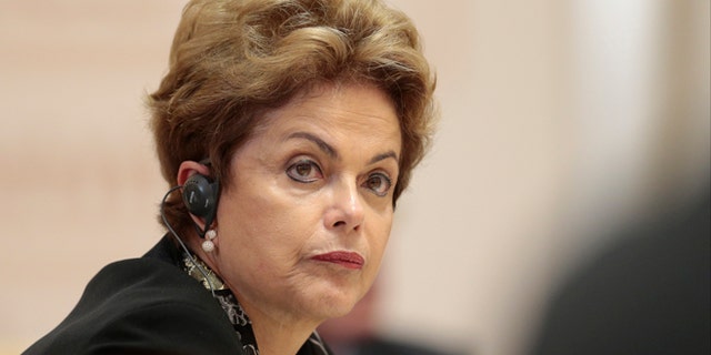 Brazil's President Dilma Rousseff listens during the BRICS summit in Ufa, Russia, Thursday, July 9, 2015. Ufa hosts SCO (Shanghai Cooperation Organization) and BRICS (Brazil, Russia, India, China and South Africa) summits. (AP Photo/Ivan Sekretarev, pool)