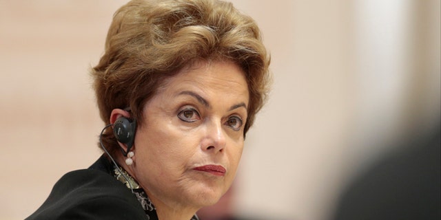 Brazil's President Dilma Rousseff listens during the BRICS summit in Ufa, Russia, Thursday, July 9, 2015. Ufa hosts SCO (Shanghai Cooperation Organization) and BRICS (Brazil, Russia, India, China and South Africa) summits. (AP Photo/Ivan Sekretarev, pool)