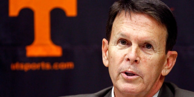 FILE - In this Nov. 18, 2012, file photo, Tennessee athletic director Dave Hart speaks to reporters at a news conference in Knoxville, Tenn. Hart said the athletic department is in better financial position now that university officials have addressed the issues that left it with a $3.98 million deficit and the lowest reserves in the SEC last year, but he acknowledged the department isn’t “out of the woods” yet in that regard. (AP Photo/Wade Payne, File)