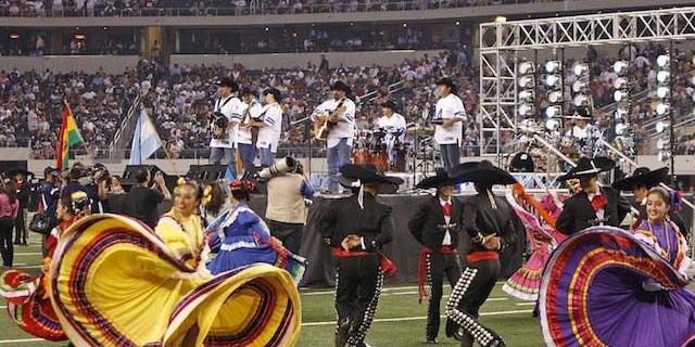 Sept. 27, 2011: 'Intocable' performs at the Dallas Cowboys stadium on Tuesday in Dallas, Texas.