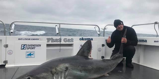 Skipper Craig Deans snapped some photos of the rare find before the crew tossed it back into the water.