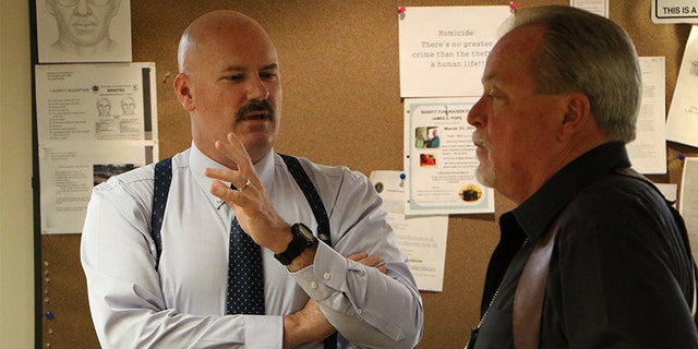 LT Tommy Potter (left) with investigator Randy Patrick.