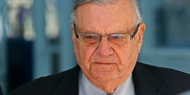 In this Jan. 25, 2017, file photo, former Maricopa County Sheriff Joe Arpaio leaves U.S. District Court.