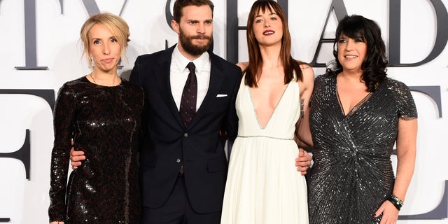 LONDON, ENGLAND - FEBRUARY 12: (L-R) Director Sam Taylor-Johnson, actors Jamie Dornan, Dakota Johnson and author E.L. James attend the UK Premiere of "Fifty Shades Of Grey" at Odeon Leicester Square on February 12, 2015 in London, England. (Photo by Ian Gavan/Getty Images)
