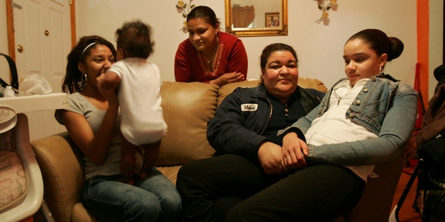 HAZLETON, PA - MARCH 14: Members of the Castillo family sit in their living room March 14, 2007 in Hazleton, Pennsylvania. (Photo by Spencer Platt/Getty Images)