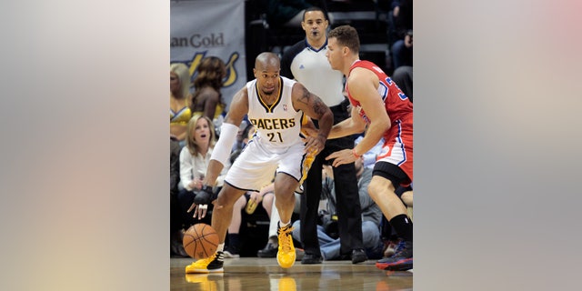 Indiana Pacers forward David West, left, backs down Los Angeles Clippers forward Blake Griffin (32) during the first half of an NBA basketball game in Indianapolis, Saturday, Jan. 18, 2014. Later in the first half, West was ejected on a flagrant foul on Griffin/ The Pacers won 106-92. (AP Photo/AJ Mast)