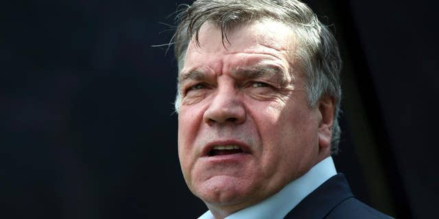 FILE - In this Sunday, May 24, 2015 file photo, Sam Allardyce waits at the start of the English Premier League soccer match between Newcastle United and West Ham United's at St James' Park, Newcastle, England. Former England manager Sam Allardyce has arrived at Crystal Palace’s training ground and says he will “complete talks” with the club’s chairman regarding its managerial vacancy. Allardyce is the favorite to take over at Palace following the firing of Alan Pardew on Thursday Dec. 22, 2016. (AP Photo/Scott Heppell, file)