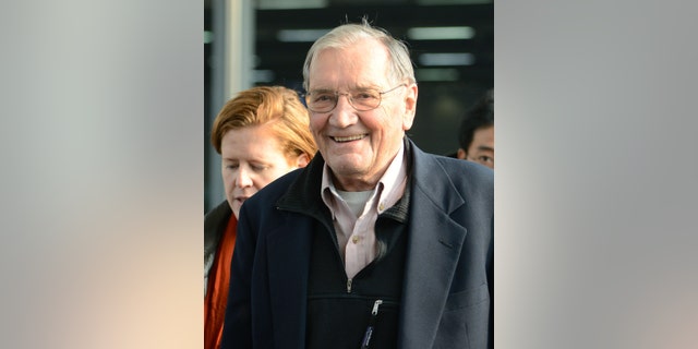 U.S. tourist Merrill Newman smiles upon arrival at Beijing airport Saturday, Dec. 7, 2013 after being released by North Korea. North Korea deported Newman who was detained for more than a month, apparently ending the saga of his return to the North six decades after he advised South Korean guerrillas still loathed by Pyongyang. North Korea made the decision because the 85-year-old Newman had apologized for his alleged crimes during the Korean War and because of his age and medical condition, according to the North's official Korean Central News Agency. (AP Photo/Kyodo News) JAPAN OUT, CREDIT MANDATORY
