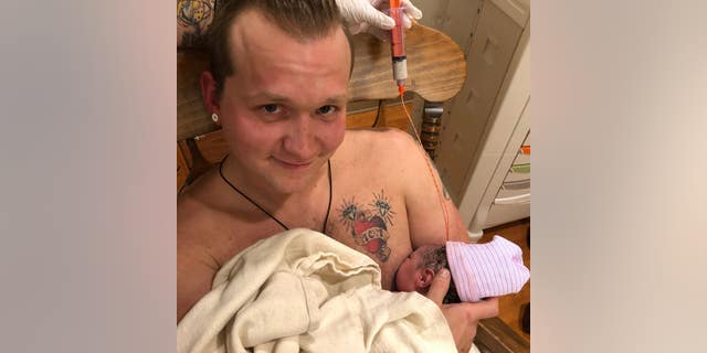 Maxamillian Neubauer "breastfed" his newborn daughter with the help of a nurse and a "suction cup fake nipple."