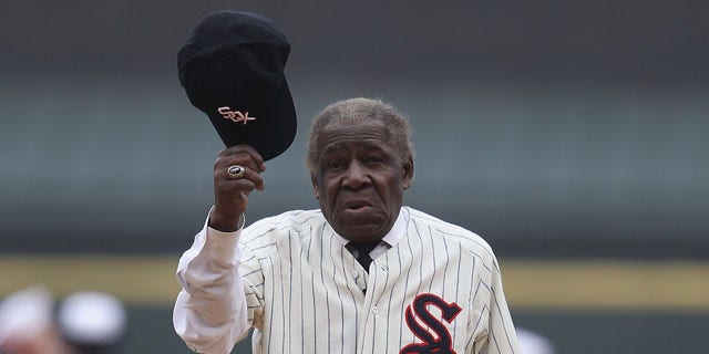 CHICAGO, IL - APRIL 07: Six time All-Star Minnie Minoso waves his hat to the crowd as he's introducted to throw out a ceremonial first pitch before the home opener between the Chicago White Sox and the Tampa Bay Rays at U.S. Cellular Field on April 7, 2011 in Chicago, Illinois. (Photo by Jonathan Daniel/Getty Images)