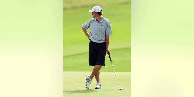 FILE - In this May 24, 2014, file photo, Stanford's Cameron Wilson waits to putt on the sixth green during the second round of the NCAA college men's golf championship at Prairie Dunes Country Club in Hutchinson, Kan. This week's Travelers Championship will feature the pro debuts of several of the top amateur players in the world, including Stanford teammates Patrick Rodgers and Wilson. (AP Photo/The Hutchinson News, Travis Morisse)