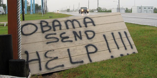 May 2: A sign on the side of a road in Boothville, La. calls for help to combat the massive Gulf oil spill.