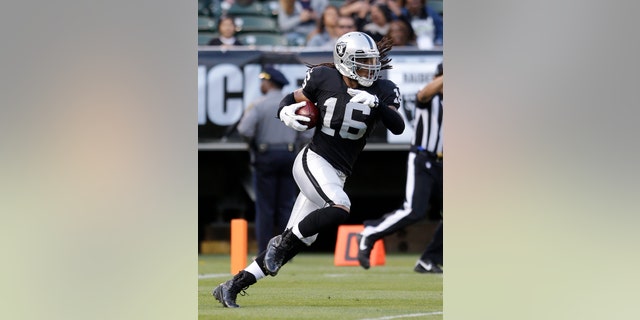 FILE - in this Aug. 23, 2013, file photo, Oakland Raiders' Josh Cribbs returns a kick against the Chicago Bears in the first half of an NFL football game in Oakland, Calif. The New York Jets have signed Cribbs, a three-time Pro Bowl wide receiver-kick returner, to help on special teams and add depth to their banged-up receiving corps. He was cut by Oakland in the preseason after having offseason surgery to repair a torn meniscus in his left knee. (AP Photo/Jeff Chiu, File)