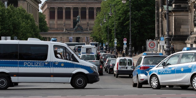 Police vehicles stand in front of Berlin Cathedral, Sunday June 3, 2018.