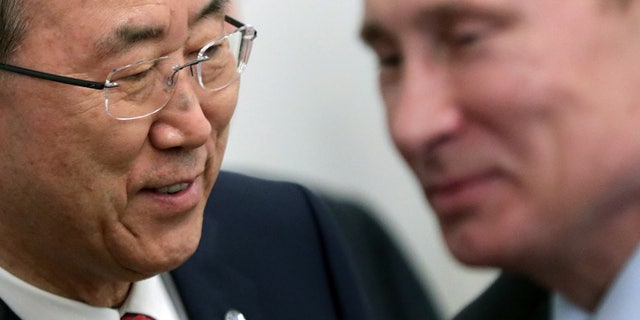 Russian President Vladimir Putin, right, and U.N. Secretary-General Ban Ki-moon meet in the Bocharov Ruchei residence in the Black Sea resort of Sochi, Russia, Friday, May 17, 2013. (AP Photo/Maxim Shipenkov, Pool)